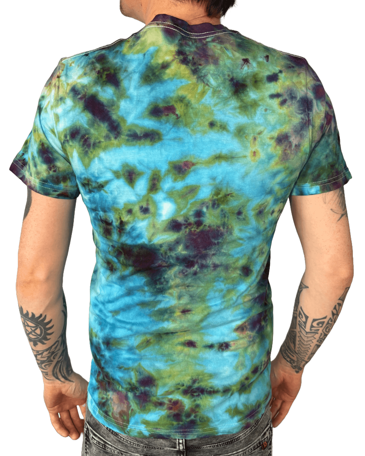 Model wearing hand-dyed turquoise and green camo tie-dye T-shirt for alternative fashion lovers