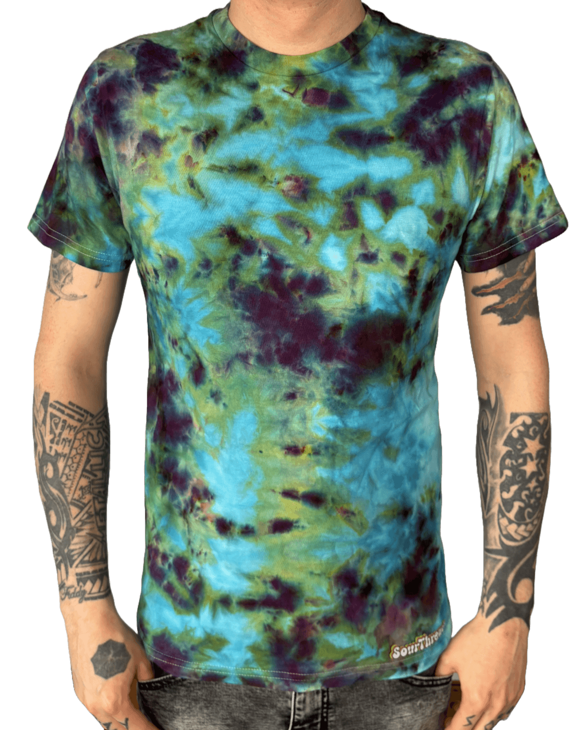 Model wearing hand-dyed turquoise and green camo tie-dye T-shirt for alternative fashion lovers